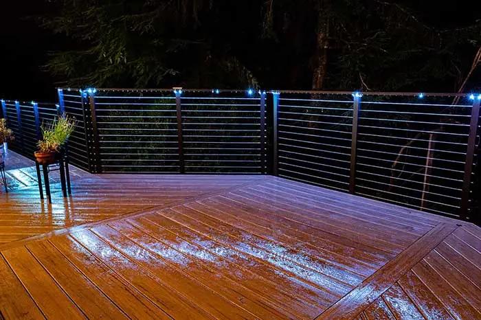 Deck railing with embedded lighting