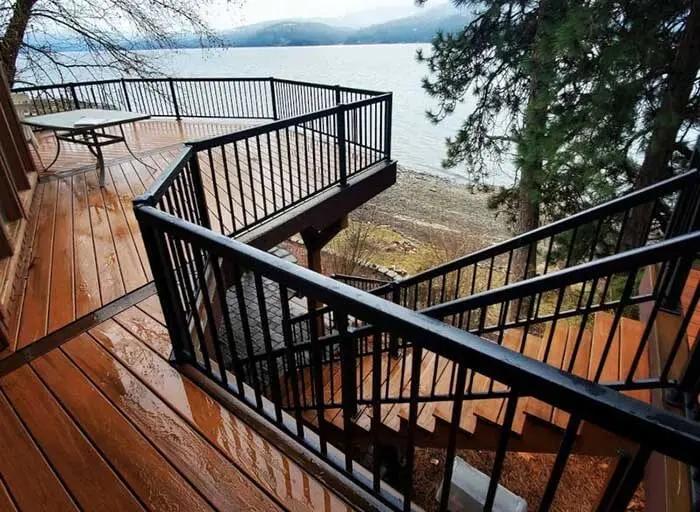 Balcony stairs made from composite deck materials and metal picket railing in Bellevue, Washington.