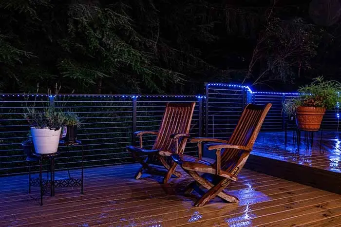 Cable railing installation at night without outdoor furniture