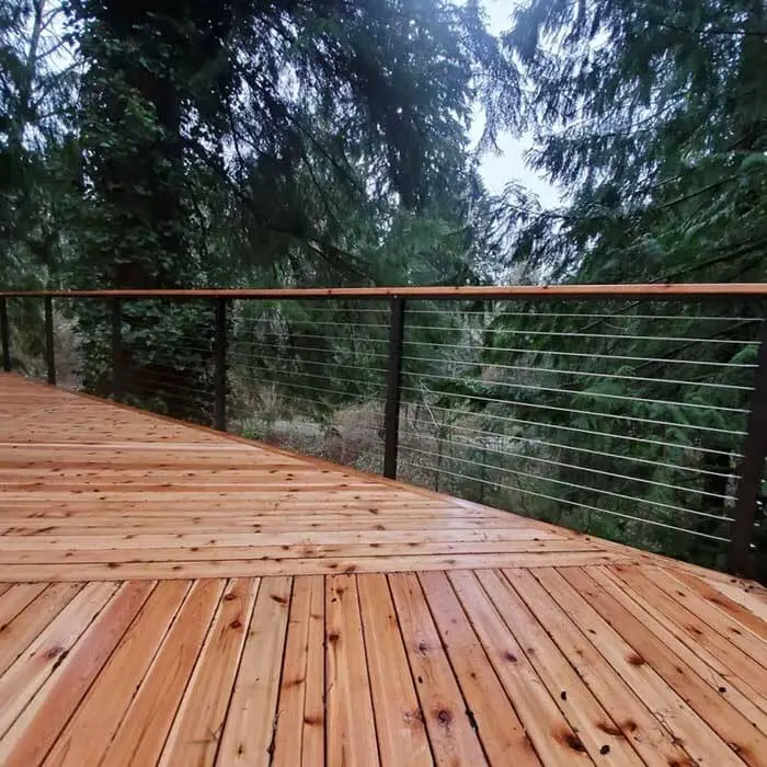 Tree fort cedar wood Seattle forest deck see through railing.